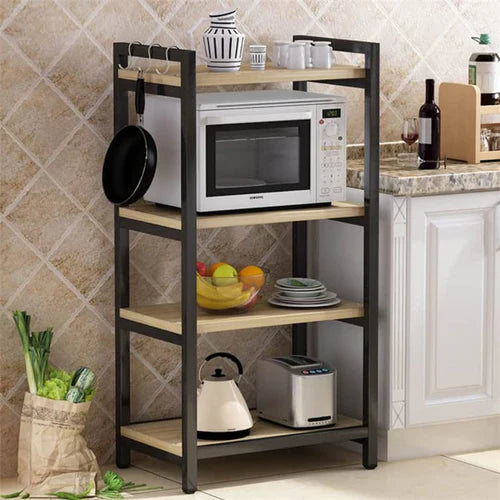 A 4-tier kitchen microwave rack with a black metal frame and beige wooden shelves, containing a microwave, electric kettle, and various kitchen items.