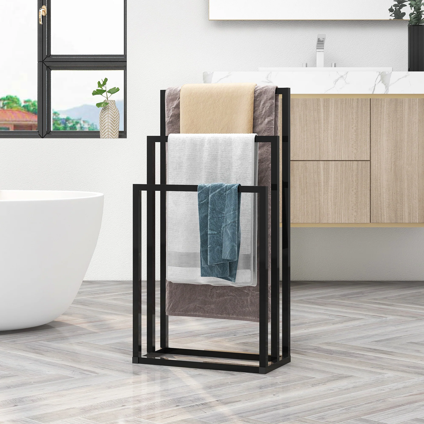 Close-up view of black towel stand showing bar detail in real use