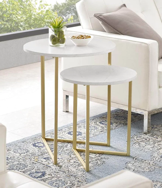 Set of two nesting coffee tables with marble-textured tops and gold frames in living room – MetalX