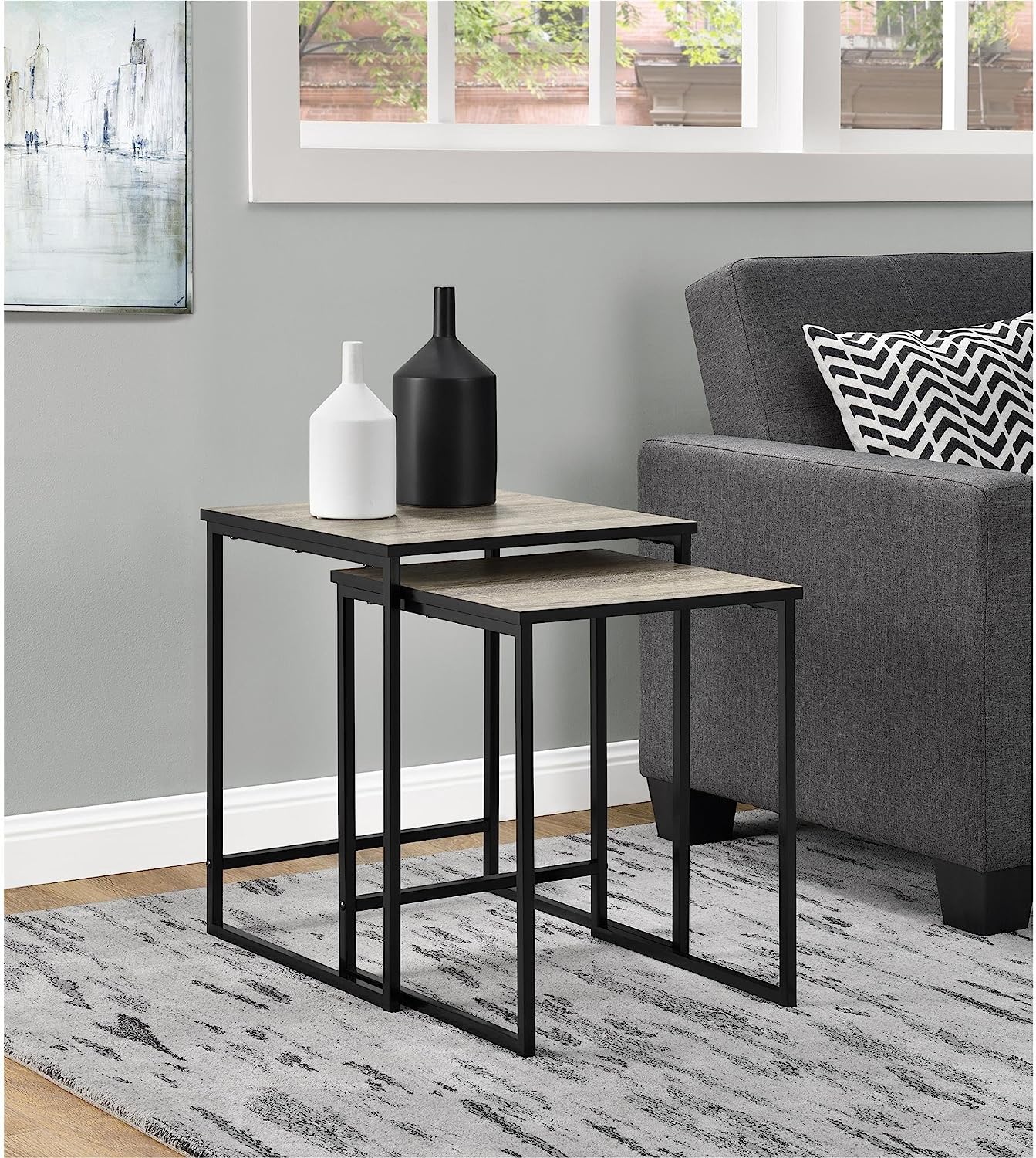 Side and front angle of MetalX Home Stewart nesting tables in room setting