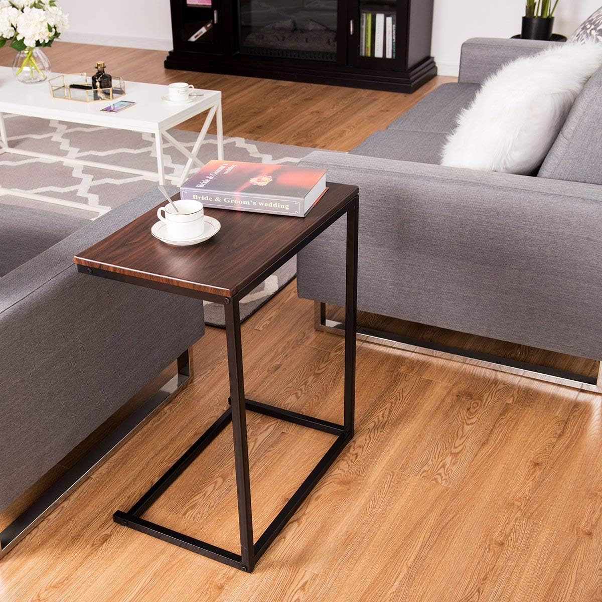 Laptop stand in real home or office setup, showcasing its practical use – MetalX