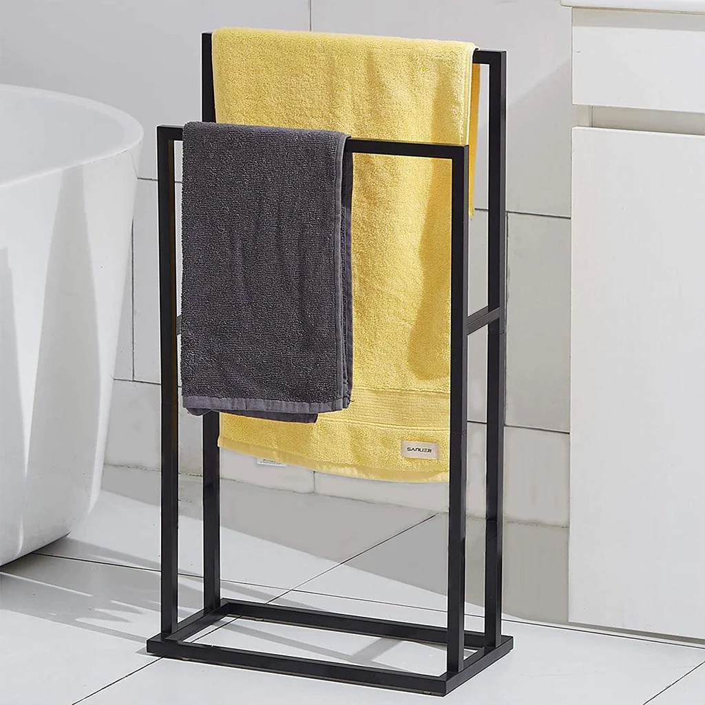 Luxury black towel hanger by MetalX displayed in a modern bathroom setting