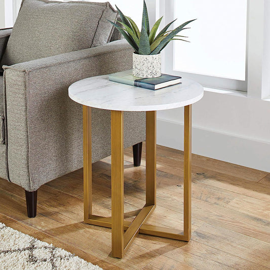 Modern side table with textured marble top and gold frame styled beside a sofa – MetalX