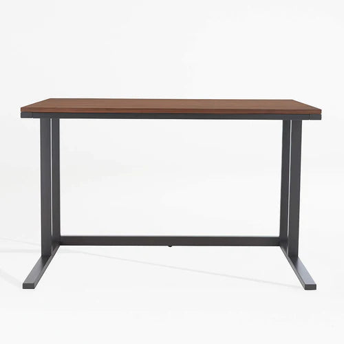 Modern office table with walnut wood finish shown in a functional home office layout – MetalX