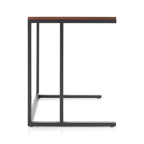 Side profile of Pilsen office desk with walnut top and black metal legs on white background – MetalX