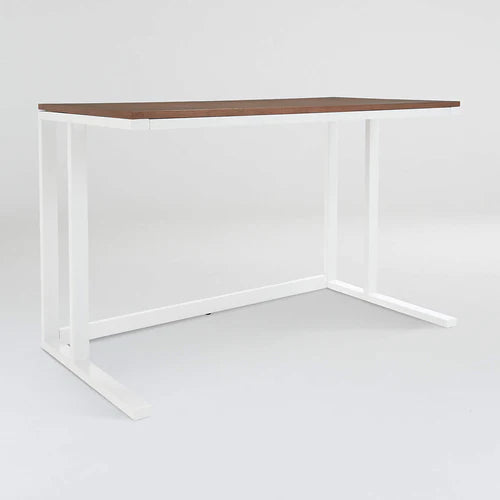 Pilsen office table with white top and black frame styled in a minimal workspace – MetalX
