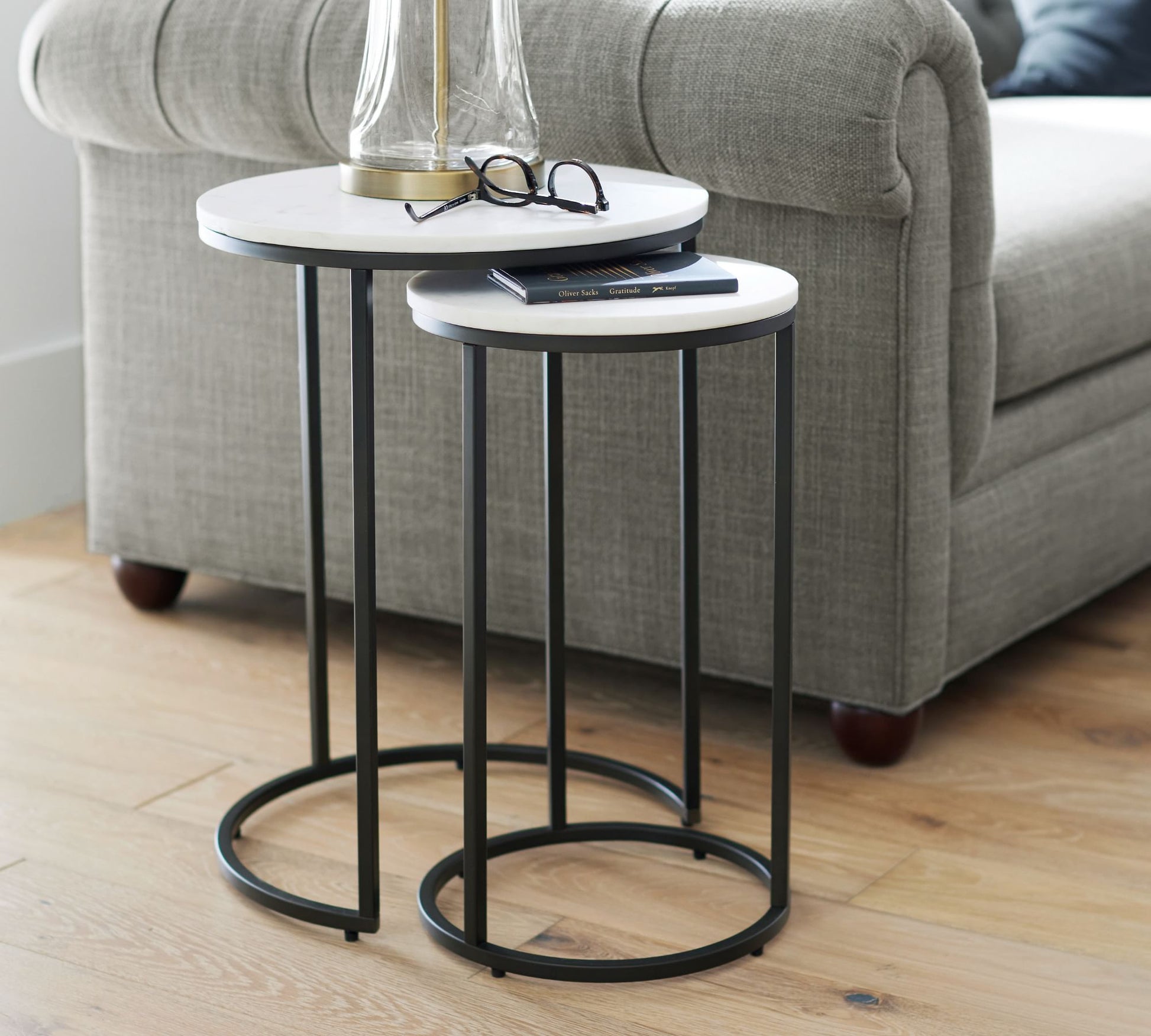 MetalX round marble texture nesting tables with black frame – display setup