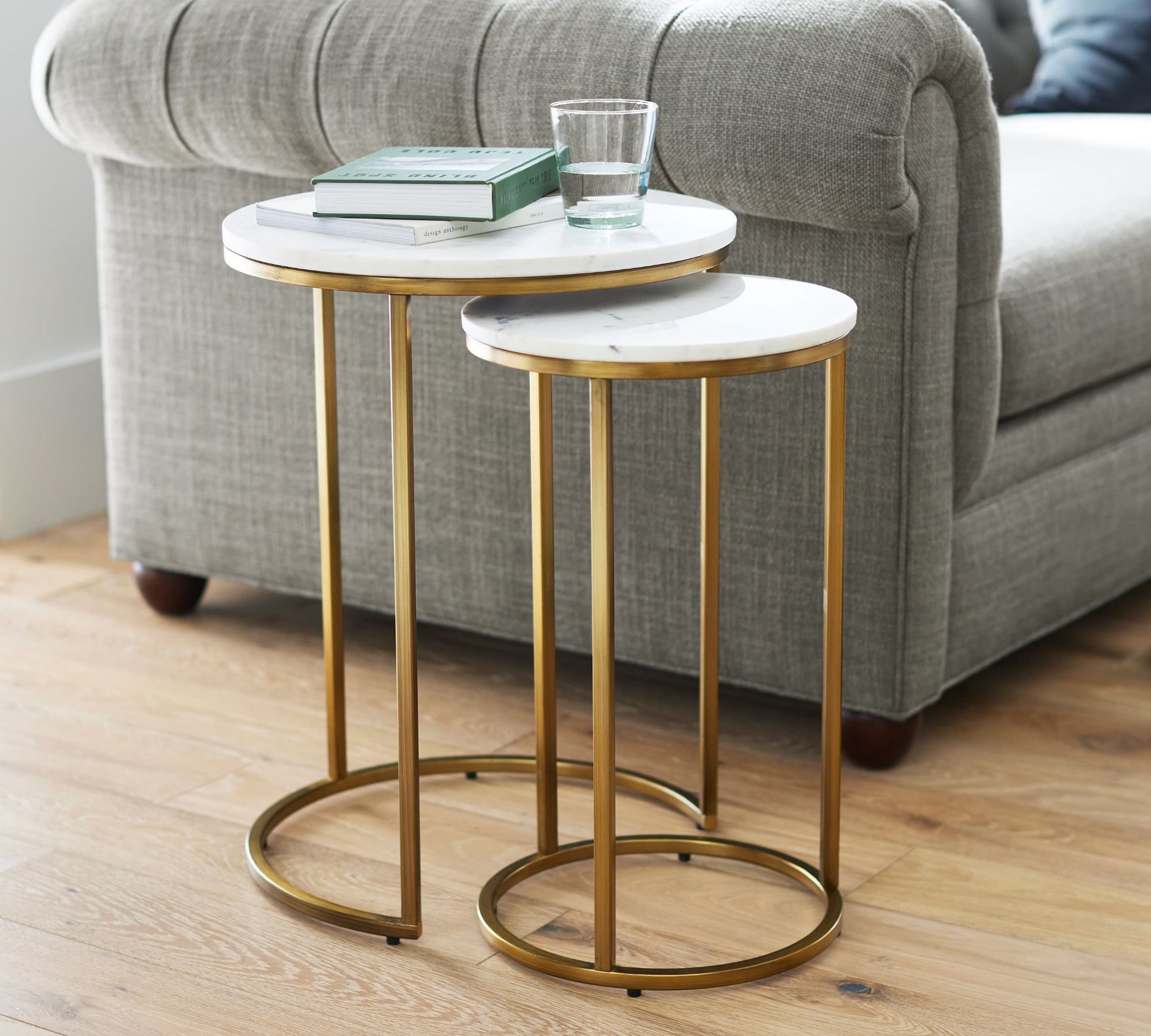 MetalX round marble texture nesting tables with gold frame – front display view