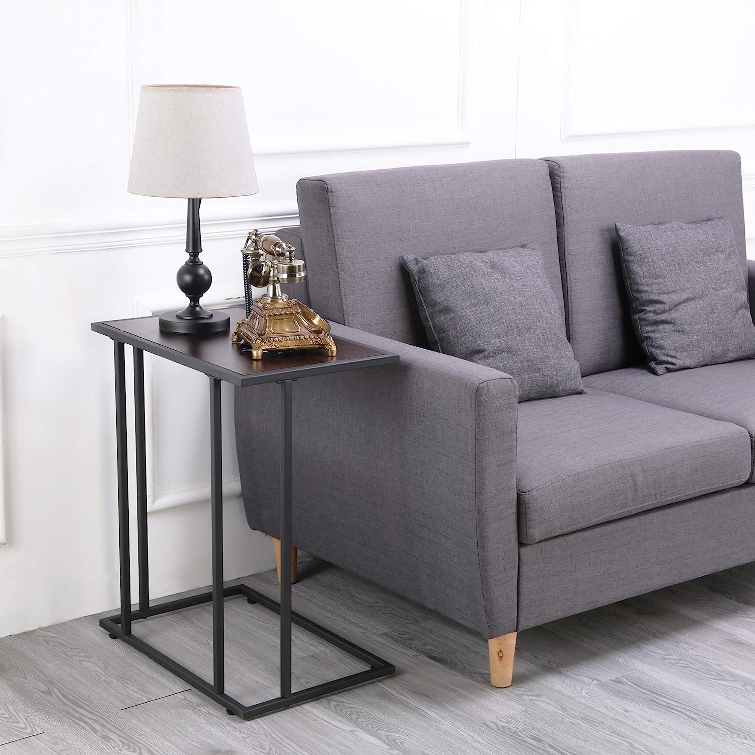 Side view of compact snack table in a living room setup, ideal for small spaces – MetalX