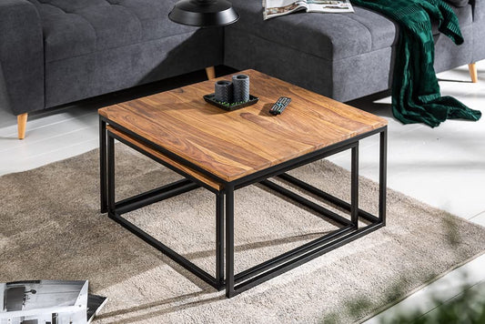 Wooden center table by MetalX shown in nested form in real-life setting
