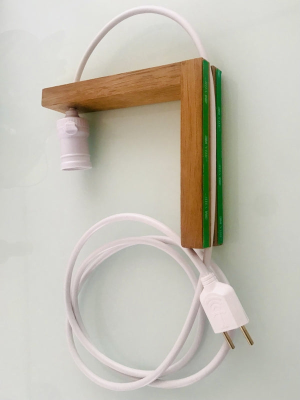 Standalone wooden bedside lamp close-up showcasing design