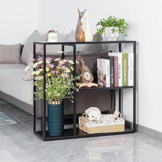 Black metal shelf with decorative items in a living room setting