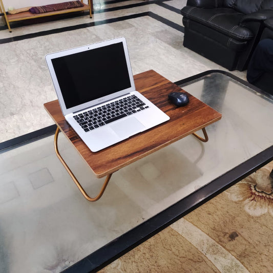 Adjustable laptop bed table with walnut top and foldable black frame, front view – MetalX