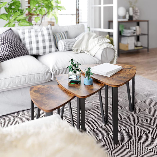 Set of 3 industrial nesting coffee tables with walnut tops and black frames in living room display – MetalX