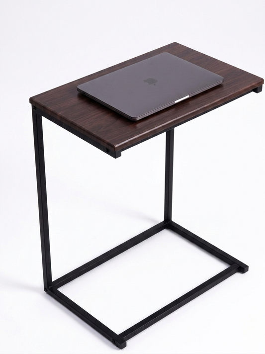 Small wooden laptop table with a black metal frame, holding an Apple laptop on a white background.