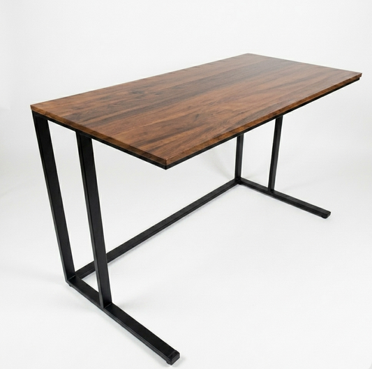 Wooden desk with black metal legs on a white background